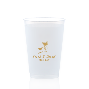 Cheers to love with the Toasting Hands Wedding Cup, adorned with a delightful cartoon hand raising a glass of wine in celebration. Beneath this charming graphic, add a personal touch with the couple's names in a playful script font, followed by the event date in a classic serif. A delightful addition to your wedding day festivities.