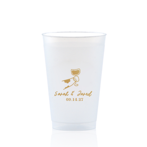 Cheers to love with the Toasting Hands Wedding Cup, adorned with a delightful cartoon hand raising a glass of wine in celebration. Beneath this charming graphic, add a personal touch with the couple's names in a playful script font, followed by the event date in a classic serif. A delightful addition to your wedding day festivities.
