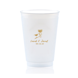 Cheers to love with the Toasting Hands Wedding Cup, adorned with a delightful cartoon hand raising a glass of wine in celebration. Beneath this charming graphic, add a personal touch with the couple's names in a playful script font, followed by the event date in a classic serif. A delightful addition to your wedding day festivities.