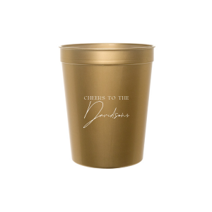 Raise a toast with the Boho Terracotta Cheers to the Wedding Cup, where rustic meets refinement. The phrase "Cheers to the" is beautifully presented in a classic serif font, inviting you to inscribe the couple's surname below in a sophisticated script. A cup that embodies the warmth and subtle drama of your autumnal nuptials.