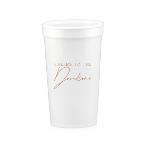 Raise a toast with the Boho Terracotta Cheers to the Wedding Cup, where rustic meets refinement. The phrase "Cheers to the" is beautifully presented in a classic serif font, inviting you to inscribe the couple's surname below in a sophisticated script. A cup that embodies the warmth and subtle drama of your autumnal nuptials.