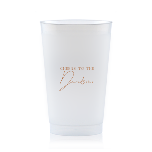 Raise a toast with the Boho Terracotta Cheers to the Wedding Cup, where rustic meets refinement. The phrase "Cheers to the" is beautifully presented in a classic serif font, inviting you to inscribe the couple's surname below in a sophisticated script. A cup that embodies the warmth and subtle drama of your autumnal nuptials.