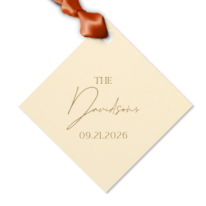 Add a personalized touch to your wedding favors with the Boho Terracotta Wedding Date Gift Tag. This tag begins with "The" in a stately serif font, followed by the newlyweds' surname in a graceful script. Finalize this bespoke detail with the date of your special day, all in the same classic font, capturing the essence of your chic and moody fall celebration.