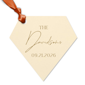 Add a personalized touch to your wedding favors with the Boho Terracotta Wedding Date Gift Tag. This tag begins with "The" in a stately serif font, followed by the newlyweds' surname in a graceful script. Finalize this bespoke detail with the date of your special day, all in the same classic font, capturing the essence of your chic and moody fall celebration.