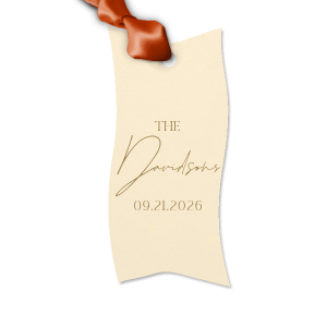 Add a personalized touch to your wedding favors with the Boho Terracotta Wedding Date Gift Tag. This tag begins with "The" in a stately serif font, followed by the newlyweds' surname in a graceful script. Finalize this bespoke detail with the date of your special day, all in the same classic font, capturing the essence of your chic and moody fall celebration.