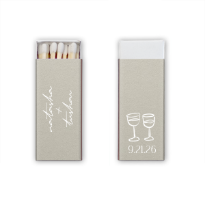 Light up your autumnal love story with the Boho Terracotta Line Art Wedding Matchbox. Customize one side with the couple's names elegantly scripted, symbolizing unity. The other side is adorned with a minimalist line drawing of two clinking wine glasses, topped by the wedding date in a refined serif font, ready to commemorate your chic, moody celebration.