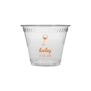 Captivate your guests with the Minimal Bridal Shower Cup, displaying a delicate wine glass illustration. Beneath it, the date of the event is inscribed in a refined sans serif font, while the bride-to-be's name adorns the top in a chic, modern script. A tasteful complement to your stylish and contemporary bridal shower.