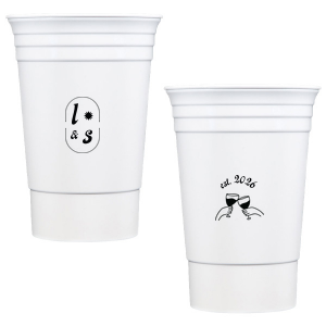 The Sunburst Initial & Toasting Glass Cup features an oval frame with classic initials, a subtle star accent, and a toast illustration with the date on the reverse. Order yours to serve drinks with a chic, custom feel guests will love. Fitting for weddings and engagement parties!