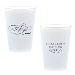 The At Last Cup features elegant calligraphy reading “At Last” reversed with the couple's names and a graceful flourish for a timeless drinkware detail. Use it to elevate your celebration with a romantic touch. Refined for wedding receptions and sentimental keepsakes.