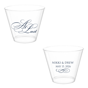 The At Last Cup features elegant calligraphy reading “At Last” reversed with the couple's names and a graceful flourish for a timeless drinkware detail. Use it to elevate your celebration with a romantic touch. Refined for wedding receptions and sentimental keepsakes.