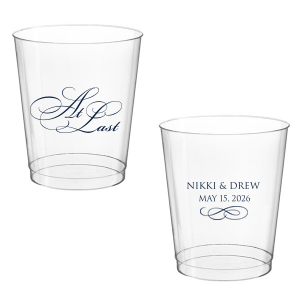 The At Last Cup features elegant calligraphy reading “At Last” reversed with the couple's names and a graceful flourish for a timeless drinkware detail. Use it to elevate your celebration with a romantic touch. Refined for wedding receptions and sentimental keepsakes.