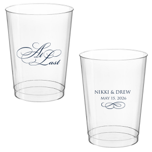 The At Last Cup features elegant calligraphy reading “At Last” reversed with the couple's names and a graceful flourish for a timeless drinkware detail. Use it to elevate your celebration with a romantic touch. Refined for wedding receptions and sentimental keepsakes.