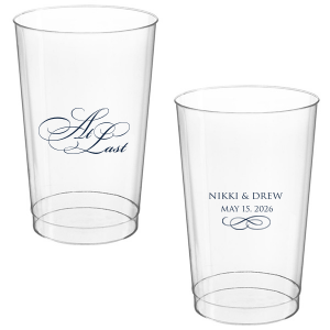 The At Last Cup features elegant calligraphy reading “At Last” reversed with the couple's names and a graceful flourish for a timeless drinkware detail. Use it to elevate your celebration with a romantic touch. Refined for wedding receptions and sentimental keepsakes.