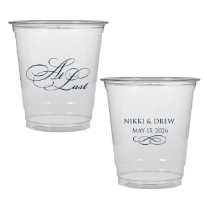The At Last Cup features elegant calligraphy reading “At Last” reversed with the couple's names and a graceful flourish for a timeless drinkware detail. Use it to elevate your celebration with a romantic touch. Refined for wedding receptions and sentimental keepsakes.