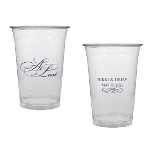 The At Last Cup features elegant calligraphy reading “At Last” reversed with the couple's names and a graceful flourish for a timeless drinkware detail. Use it to elevate your celebration with a romantic touch. Refined for wedding receptions and sentimental keepsakes.