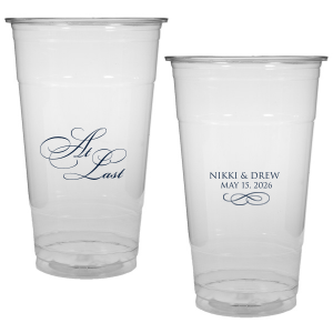 The At Last Cup features elegant calligraphy reading “At Last” reversed with the couple's names and a graceful flourish for a timeless drinkware detail. Use it to elevate your celebration with a romantic touch. Refined for wedding receptions and sentimental keepsakes.