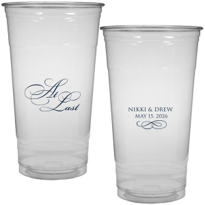 The At Last Cup features elegant calligraphy reading “At Last” reversed with the couple's names and a graceful flourish for a timeless drinkware detail. Use it to elevate your celebration with a romantic touch. Refined for wedding receptions and sentimental keepsakes.