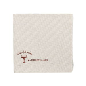 Embrace the whimsy with the A Tini Bit Older Birthday Napkin, featuring a chic, hand-drawn martini glass. The phrase "A tini bit older," scripted above the illustration, brings a playful note to the celebration. Customize beside the glass with your name and the milestone birthday in a classic serif font, adding a personal and stylish twist to your festivities.