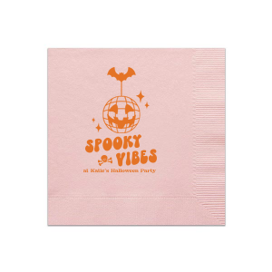 Embrace those spooky vibes with our Spooky Vibes Napkin! This custom Halloween party decor will elevate any event. Featuring a graphic of a pumpkin disco ball, bat, a skull, and sparkles, this napkin is ready to party.