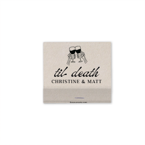Find the perfect match with the Til Death Toast Match. Heat things up at your event with this striking accessory. Adorned with two skeletal hands clinking wine glasses above personalized text, they are perfect for seasonal weddings or Halloween events.