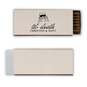 Find the perfect match with the Til Death Toast Match. Heat things up at your event with this striking accessory. Adorned with two skeletal hands clinking wine glasses above personalized text, they are perfect for seasonal weddings or Halloween events.