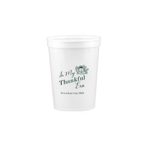 Show off your good graces with the In My Thankful Era Cup. Featuring a classic cornucopia design, this cup is easy to customize into a stylish accessory appropriate for any family holiday dinner. 