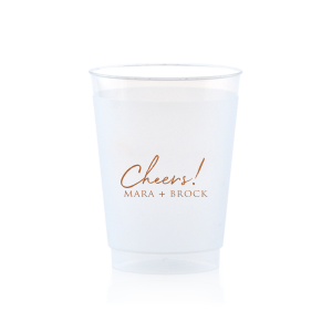 Raise a toast with the Cheers to the Couple Name Cup, where festivity meets elegance. A large, fanciful "Cheers!" in an exuberant script sets the stage for celebration, while the couple's names in bold capitals underscore the personal touch. This frosted cup's simple yet impactful design perfectly encapsulates the spirit of a joyous toast to love and unity.