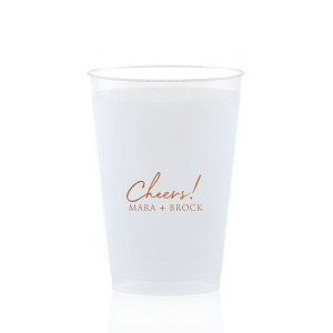 Raise a toast with the Cheers to the Couple Name Cup, where festivity meets elegance. A large, fanciful "Cheers!" in an exuberant script sets the stage for celebration, while the couple's names in bold capitals underscore the personal touch. This frosted cup's simple yet impactful design perfectly encapsulates the spirit of a joyous toast to love and unity.