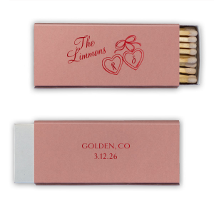 The Heart Locket Matchbox features elegant script lettering with customizable name, date, and location, and a charming ribboned locket illustration for a timeless keepsake feel. Choose it to add a sentimental detail guests will treasure. Great for weddings and anniversaries.