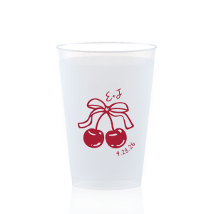 Raise a glass at your next special event with the Cherry Bow Initials Cup! The two cherries are tied together by a bow, reflecting the partnership of you and your sweetheart. Customize the text to make it extra special at your next momentous occasion, be it an engagement, wedding, anniversary or any other celebration of love.