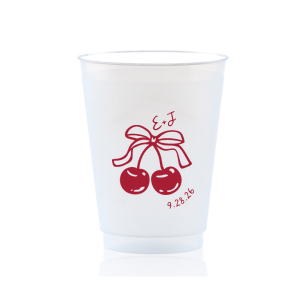 Raise a glass at your next special event with the Cherry Bow Initials Cup! The two cherries are tied together by a bow, reflecting the partnership of you and your sweetheart. Customize the text to make it extra special at your next momentous occasion, be it an engagement, wedding, anniversary or any other celebration of love.