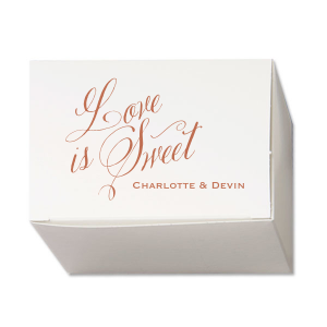 Relive sweet memories with the Love Is Sweet Box, echoing the charm of vintage cake boxes. It features "Love is Sweet" in beautiful script. Below, the couple's first names add a personalized touch, reminiscent of a cherished neighborhood bakery, celebrating the sweetness of love and the couple.