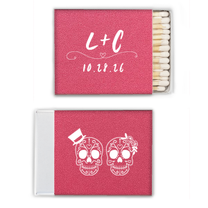 Celebrate eternal love with the Skull Couple Wedding Matchbox. Adorned with delightful sugar skulls, these matchboxes honor Dia de los Muertos—celebrating life and love. The back features the newlywed's initials and the event date, making it a unique token of vibrant tradition and joy.