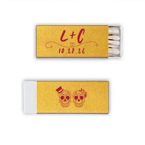 Celebrate eternal love with the Skull Couple Wedding Matchbox. Adorned with delightful sugar skulls, these matchboxes honor Dia de los Muertos—celebrating life and love. The back features the newlywed's initials and the event date, making it a unique token of vibrant tradition and joy.