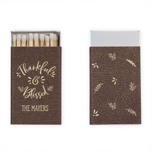Celebrate the season of gratitude with the Thankful and Blessed Matchbox. The front features an exuberant declaration of “Thankful and Blessed,” along with your family name, capturing genuine joy. The reverse showcases autumnal leaves, embodying the warmth and thankfulness of the fall season.
