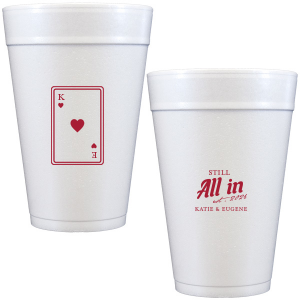Celebrate lasting love with the Playing Card Still All In Anniversary Cup. One side adorns a hearts playing card graphic, personalized with your initials. The other side is inscribed with "Still All In," alongside the celebratory year and the couple's names, symbolizing a winning hand in marriage.