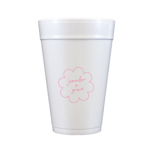 Sip in style at your whimsical wedding with the Kitschy Cocktail Hour Floral Frame Cup. Personalize this charming vessel with the couple's names, elegantly scripted within a blooming flower-shaped frame. A modern and enchanting choice for your celebratory toasts.