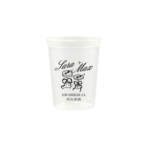 The Wedding Glass & Bow Cup is the must have trendy design for your one of a kind lifetime event. Featuring hand-drawn bows tied around champagne glasses alongside customizable text in the screen printed ink color of your choice to best pair with your party's vibe.