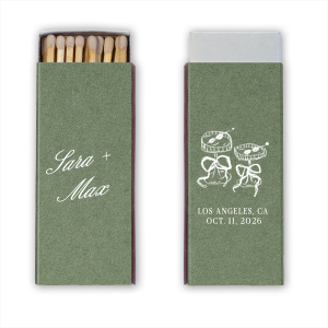 The Wedding Glass & Bow Matchbox is the stylish and trendy design for your next big party event. Featuring hand-drawn bows tied around champagne glasses alongside customizable text in the foil stamp and paper color of your choice to best pair with your party's vibe.