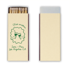 Keep the good times coming with the Olive Another Cheers Matchbox. Featuring a hand-drawn pair of glasses cheersing within a ribbon frame, the design is fully customizable in your choice of text and foil stamp colors to best match your party's aesthetic.