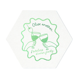 Make your party the coolest around with the Olive Another Cheers Coaster. Featuring a hand-drawn pair of glasses cheersing within a ribbon frame, the design is fully customizable in your choice of text and foil stamp colors to best match your party's aesthetic.