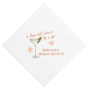 If you're looking for something stylish and functional for your next party event, you can't go wrong with the A Tini Bit Closer Ink + Foil Napkin. The cheeky design is ink printed and paired with customizable text in the foil stamp color of your choice.