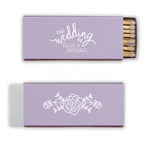 Spark the celebration with the Roses Bouquet Wedding Matchbox, where the promise of 'The wedding of' blossoms into the couple’s names. On the back, a rose bursts into a garland, lighting up your love story with floral finesse.