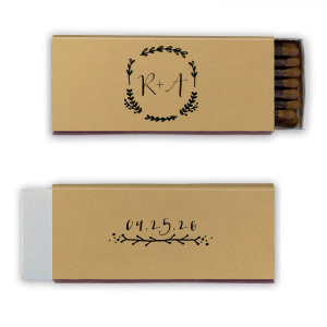 The Branch Wedding Wreath Matchbox exudes a charming, homespun vibe. Its front showcases a heart-leaf wreath encircling the couple’s initials, symbolizing their united love. On the back, a whimsical branch underlines a handwritten-style date, embodying natural beauty and simplicity.