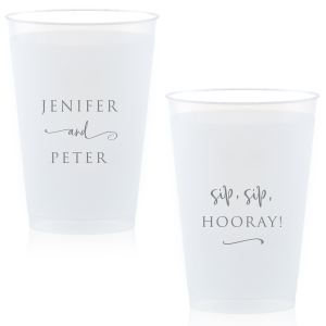 Raise your cups to cheer with the Stacked and Swirled/Sip Sip Hooray Frosted Cup—a design that celebrates love with elegance and a playful twist. Names are gracefully stacked, connected by a swirling flourish, while the reverse side exclaims "Sip Sip Hooray!", infusing joy into every toast.