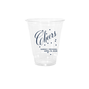 Toast in style with the Cheers Bubble Cup, brimming with effervescence. The word "Cheers" is beautifully rendered in swirling script, surrounded by lively bubble dots, capturing a sense of bubbly joy. Below, the couple's names and event date in block font add a personalized touch to this vibrant celebratory design.