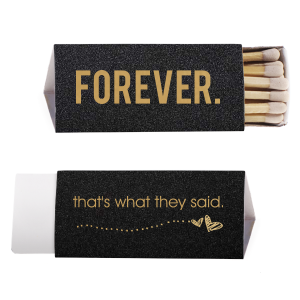 The That's What They Said Wedding Match is an engaging blend of contemporary vernacular and artistry. One panel displays the modern phrase “That’s what they said,” while another whimsically illustrates hearts soaring, leaving a trail of dots. The third side, with a bold "FOREVER," encapsulates eternal romance. This is a design that communicates boldly and artistically. 