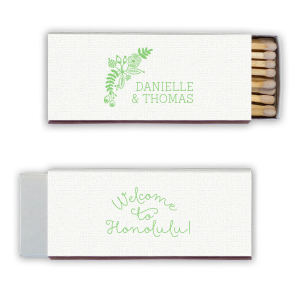 Set the scene for island fun with the Tropical Celebration Match, where vibrant foliage frames the couple's names. Flip for a custom message that whisks guests away to paradise, one striking spark at a time.