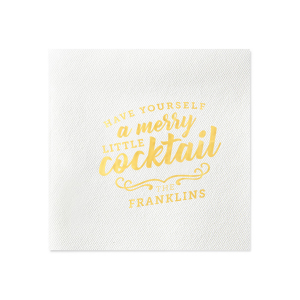 The Merry Little Cocktail Napkin features playful vintage-style lettering reading “have yourself a merry little cocktail” with a family name below for festive charm. Add it to your bar setup to spread cheer and elevate seasonal entertaining. Excellent for holiday parties!