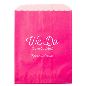 Celebrate sweet love with the We Do Love Cookies Bag, a delightful treat for sharing gifts with your guests. . It features a large, playful “We Do” at the top, with “(Love Cookies)” whimsically enclosed in parentheses below, expressing the couple’s fondness for cookies Or other gift item. Their names in candied script at the bottom add a charming touch to this gift.